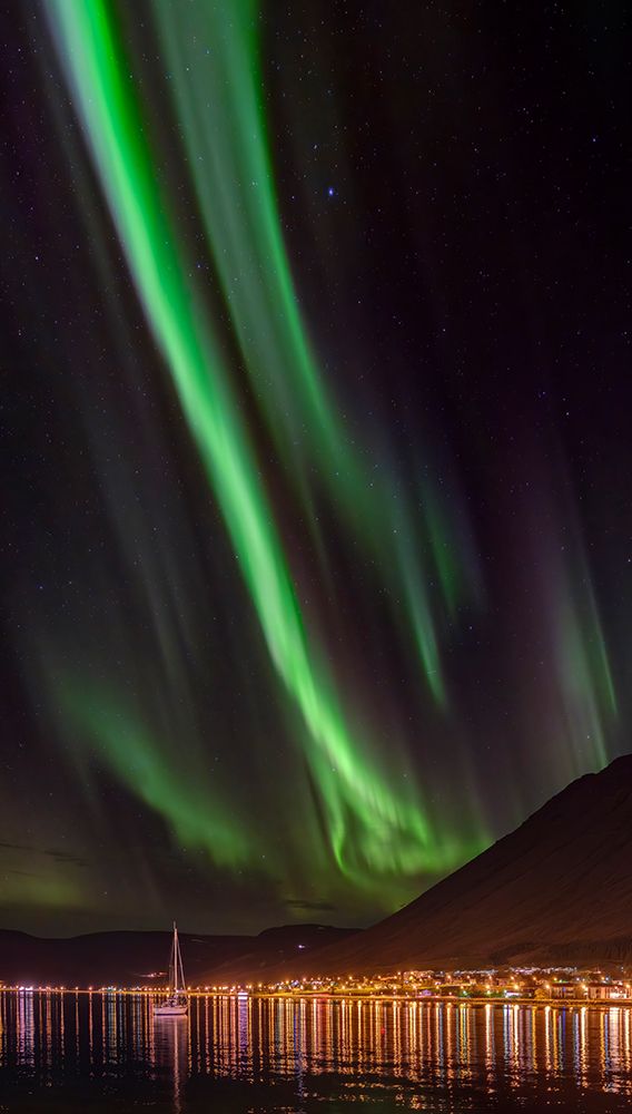 Iceland. Northern Lights over Isafjordur, the capital of the Westfjords during autumn.
